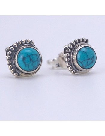 Pendientes de plata con piedra turquesa.