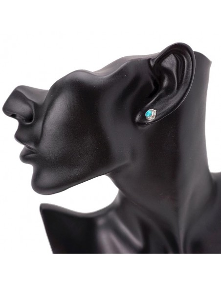 Pendientes de plata con piedra turquesa.